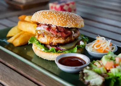 Chicken burger with chips at New Leaf Eatery Siem Reap Cambodia