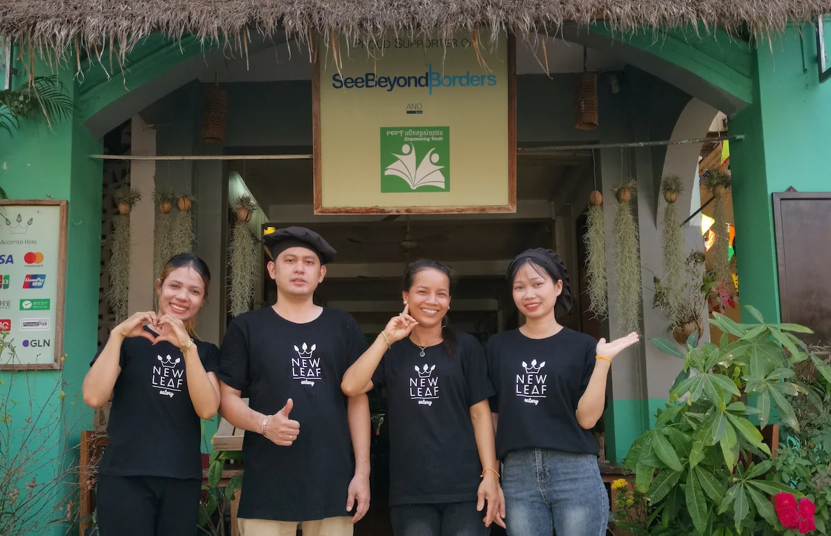 New Leaf Eatery team outside their social enterprise restaurant in Siem Reap Cambodia supporting SeeBeyondBorders and PEPY Empowering Youth