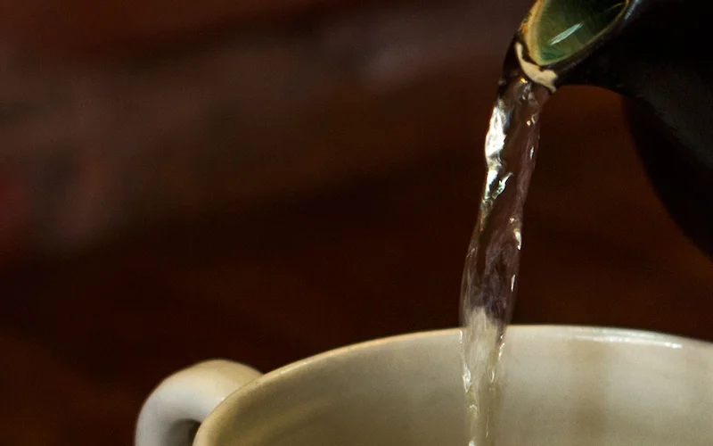Pouring a cup of tea at New Leaf Siem Reap