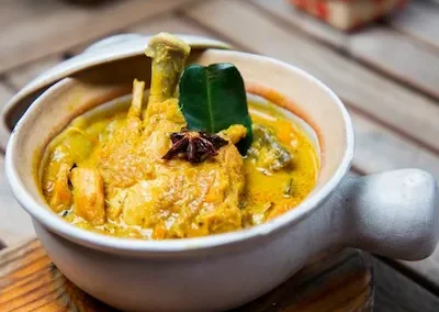 Traditional Khmer chicken curry with coconut milk at New Leaf Eatery Siem Reap Cambodia